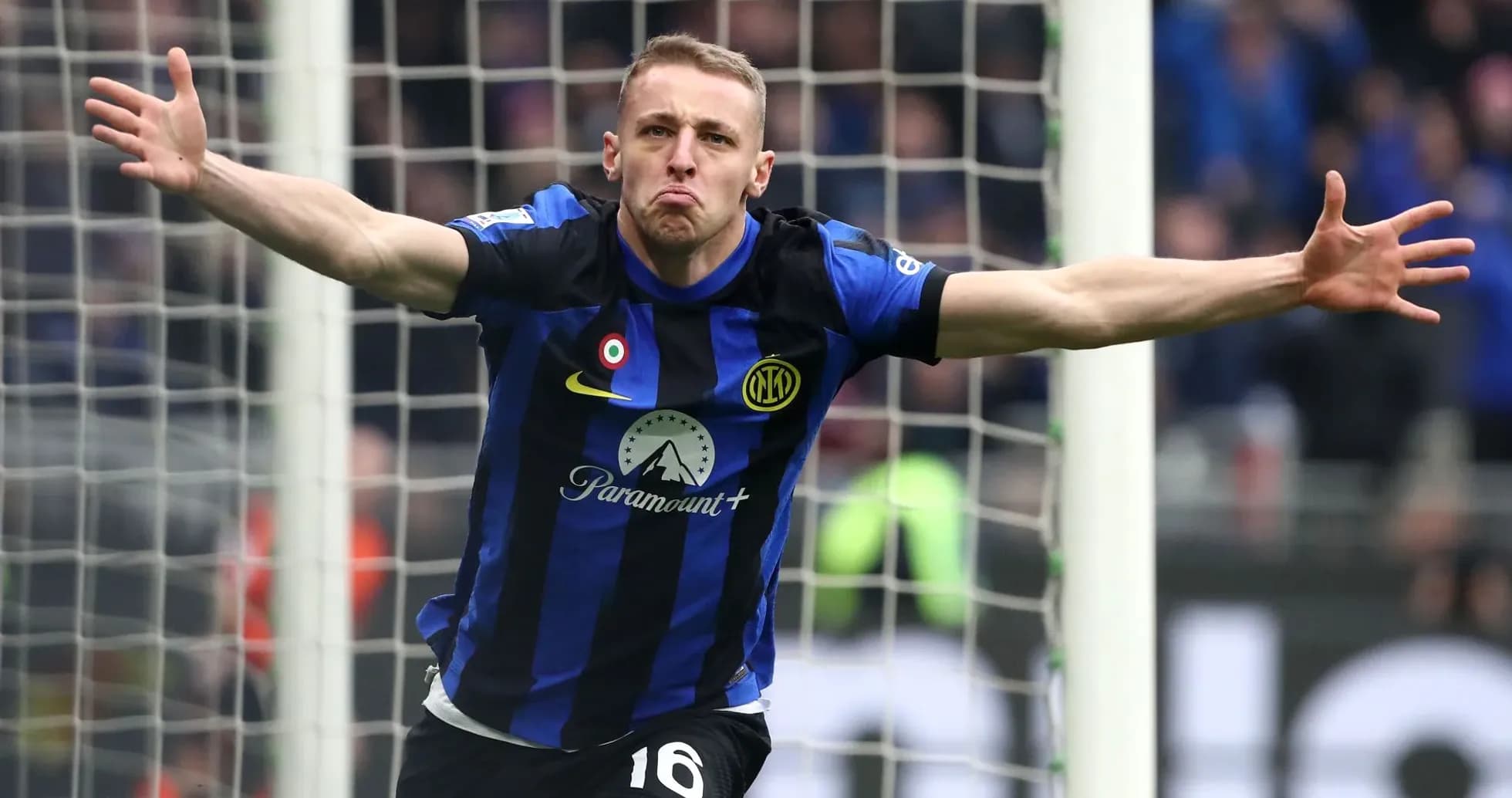 Player celebrating a goal with outstretched arms Player celebrating a goal with outstretched arms