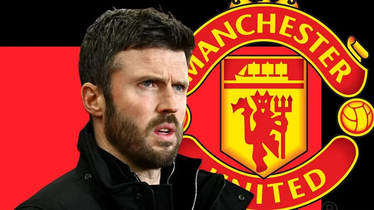Coach in front of Manchester United logo backdrop Coach in front of Manchester United logo backdrop