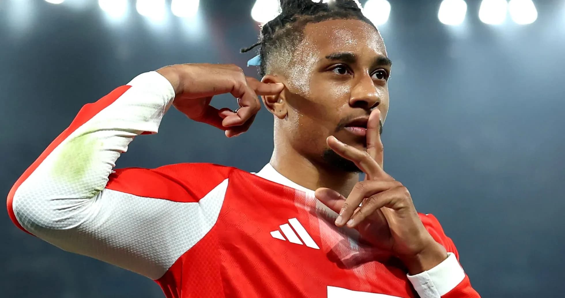 Player celebrating with finger on lips gesture Player celebrating with finger on lips gesture