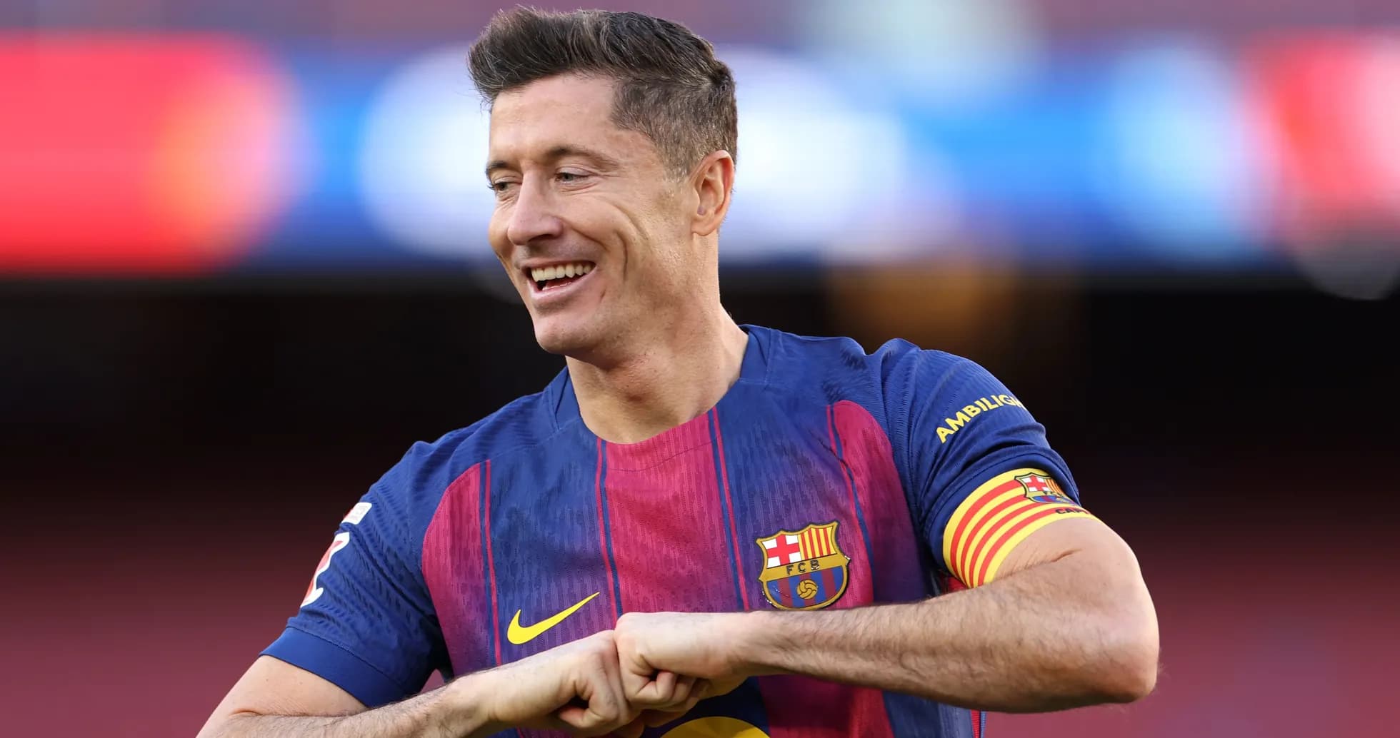 Player celebrating in Barcelona jersey at stadium Player celebrating in Barcelona jersey at stadium