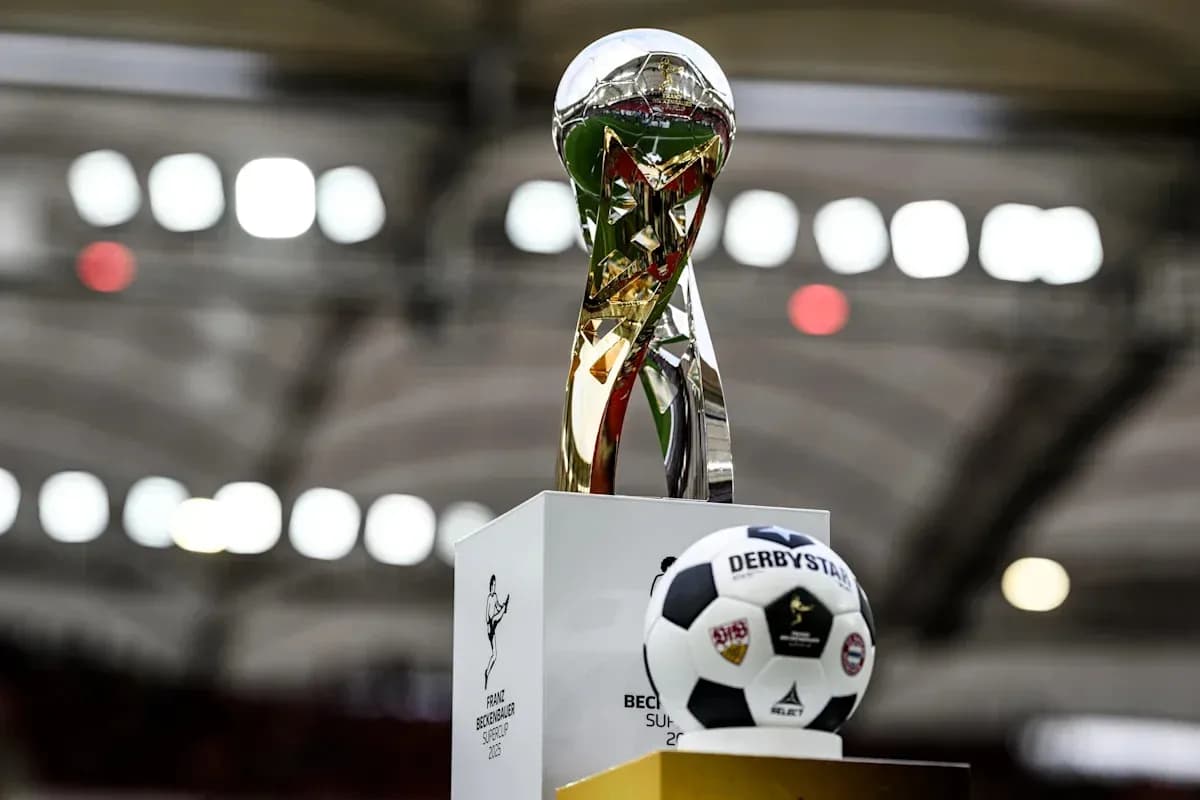 Franz Beckenbauer Supercup trophy with soccer ball Franz Beckenbauer Supercup trophy with soccer ball