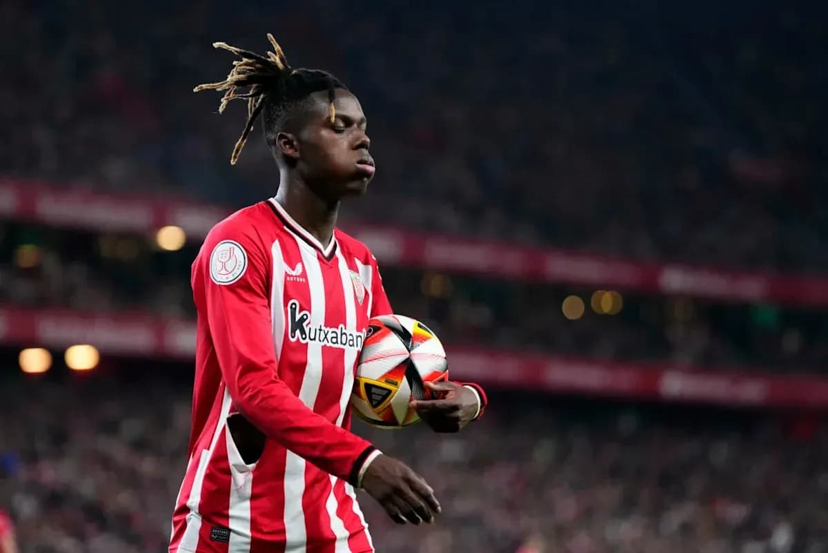 Player holding the ball during match at stadium Player holding the ball during match at stadium