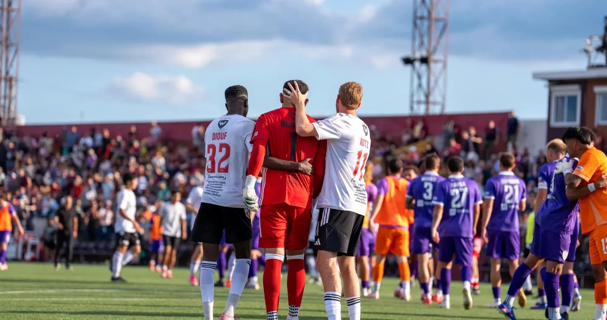 Players celebrating after a USL League One match Players celebrating after a USL League One match