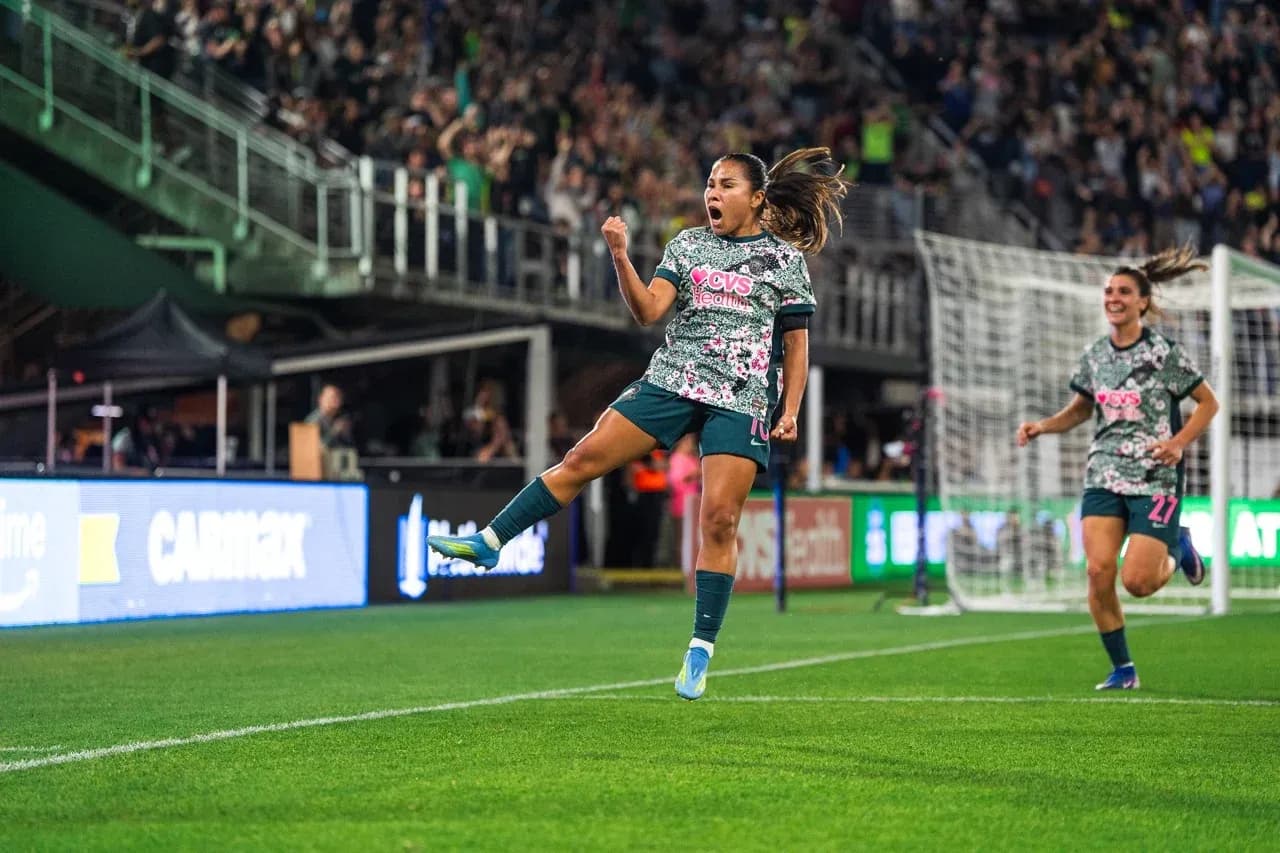 Player celebrating during Seattle Reign FC match Player celebrating during Seattle Reign FC match