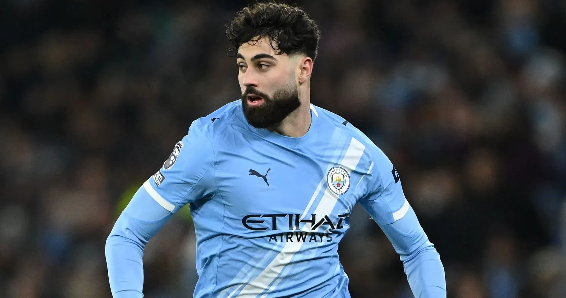Player in Manchester City kit during match Player in Manchester City kit during match