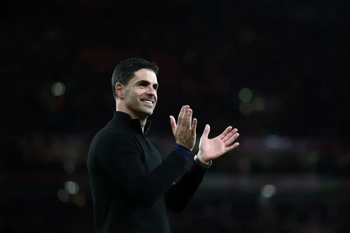 Manager applauding fans after a match Manager applauding fans after a match