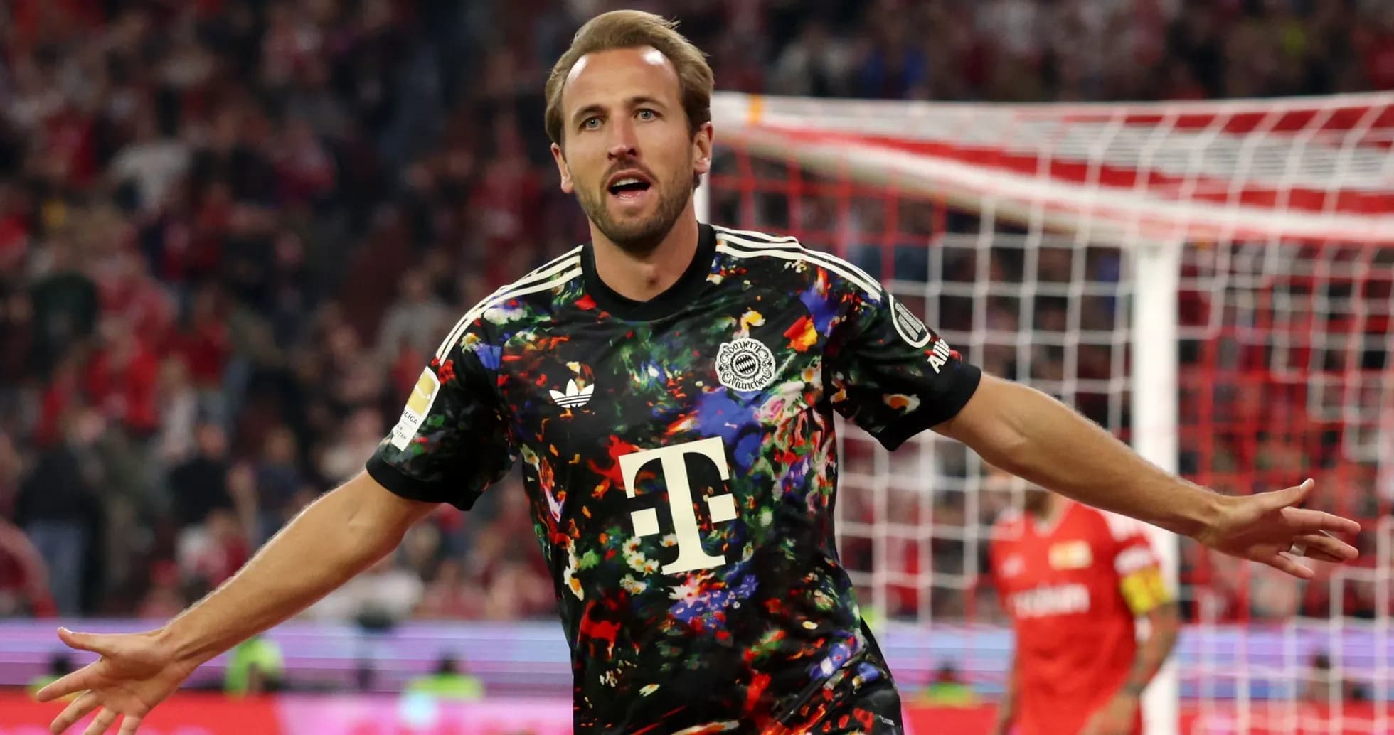 Player celebrating goal in colorful jersey during match Player celebrating goal in colorful jersey during match