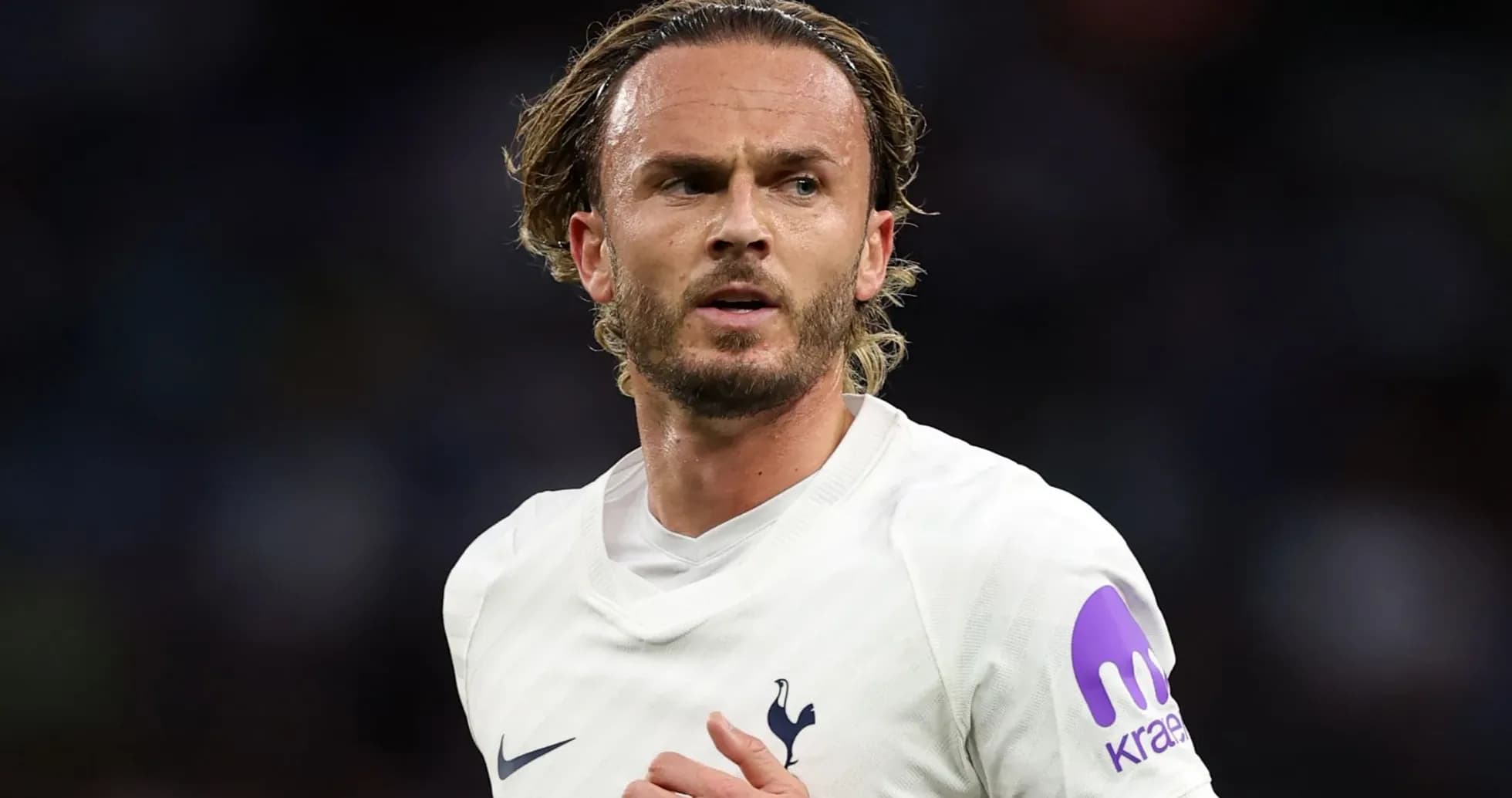 Player in Tottenham jersey during a match Player in Tottenham jersey during a match