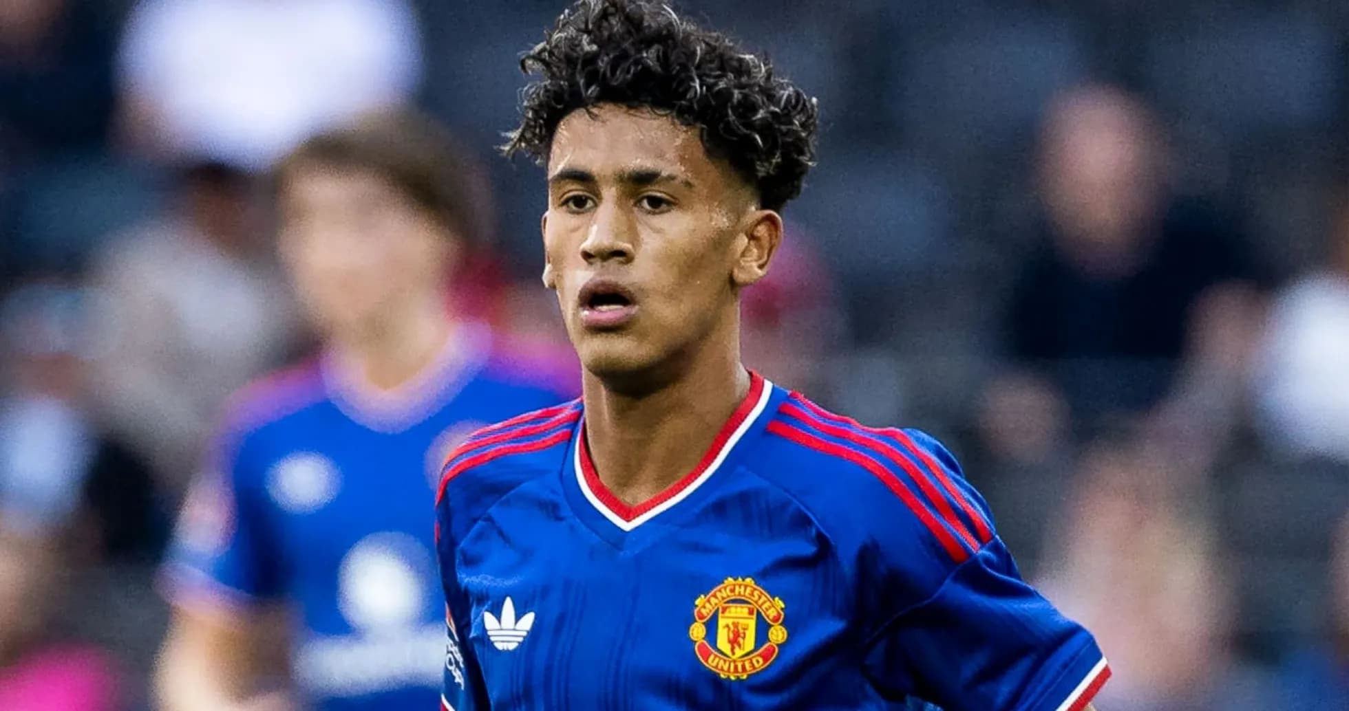 Player in Manchester United kit during match Player in Manchester United kit during match