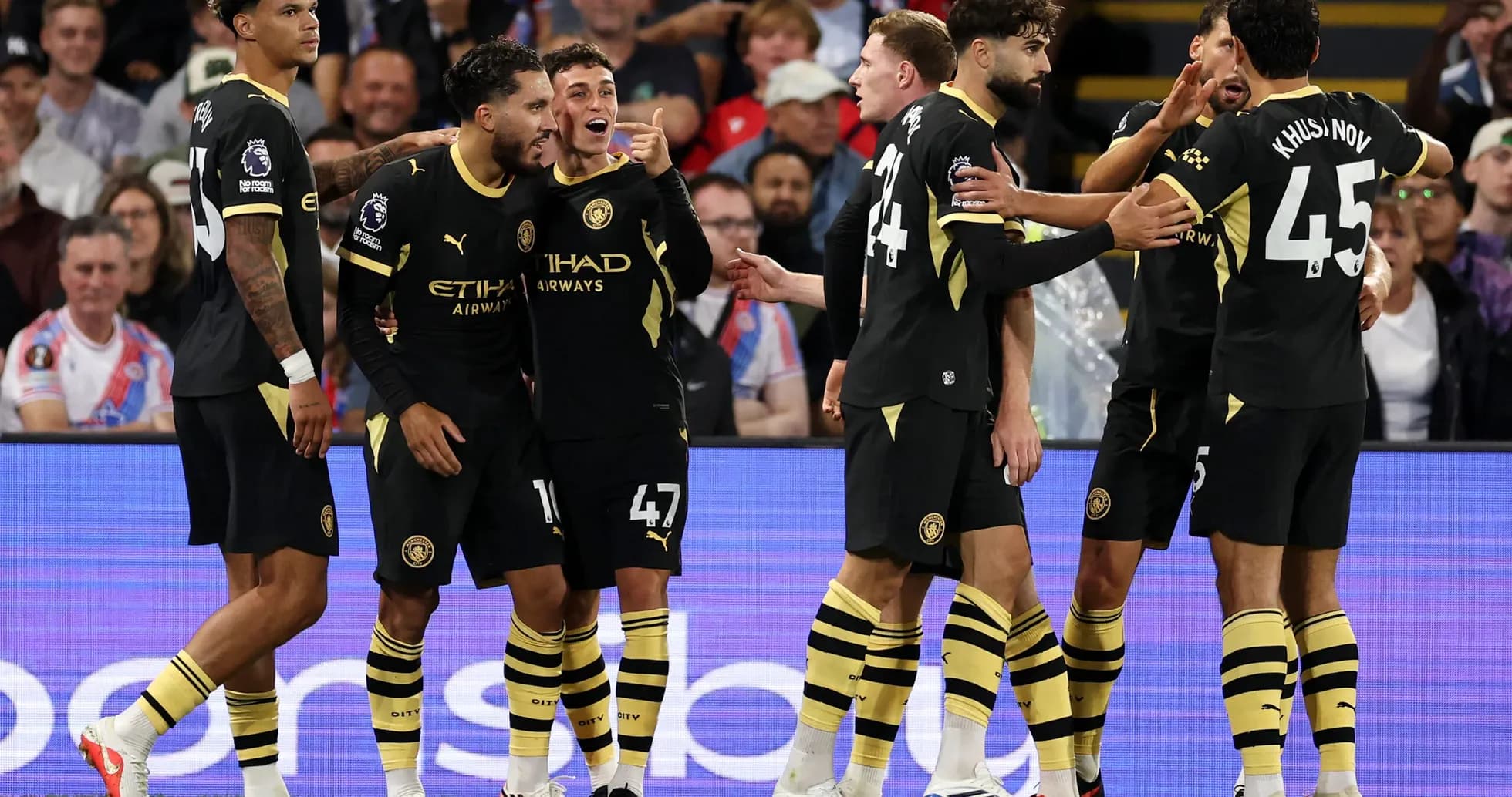 Manchester City players celebrating a goal Manchester City players celebrating a goal