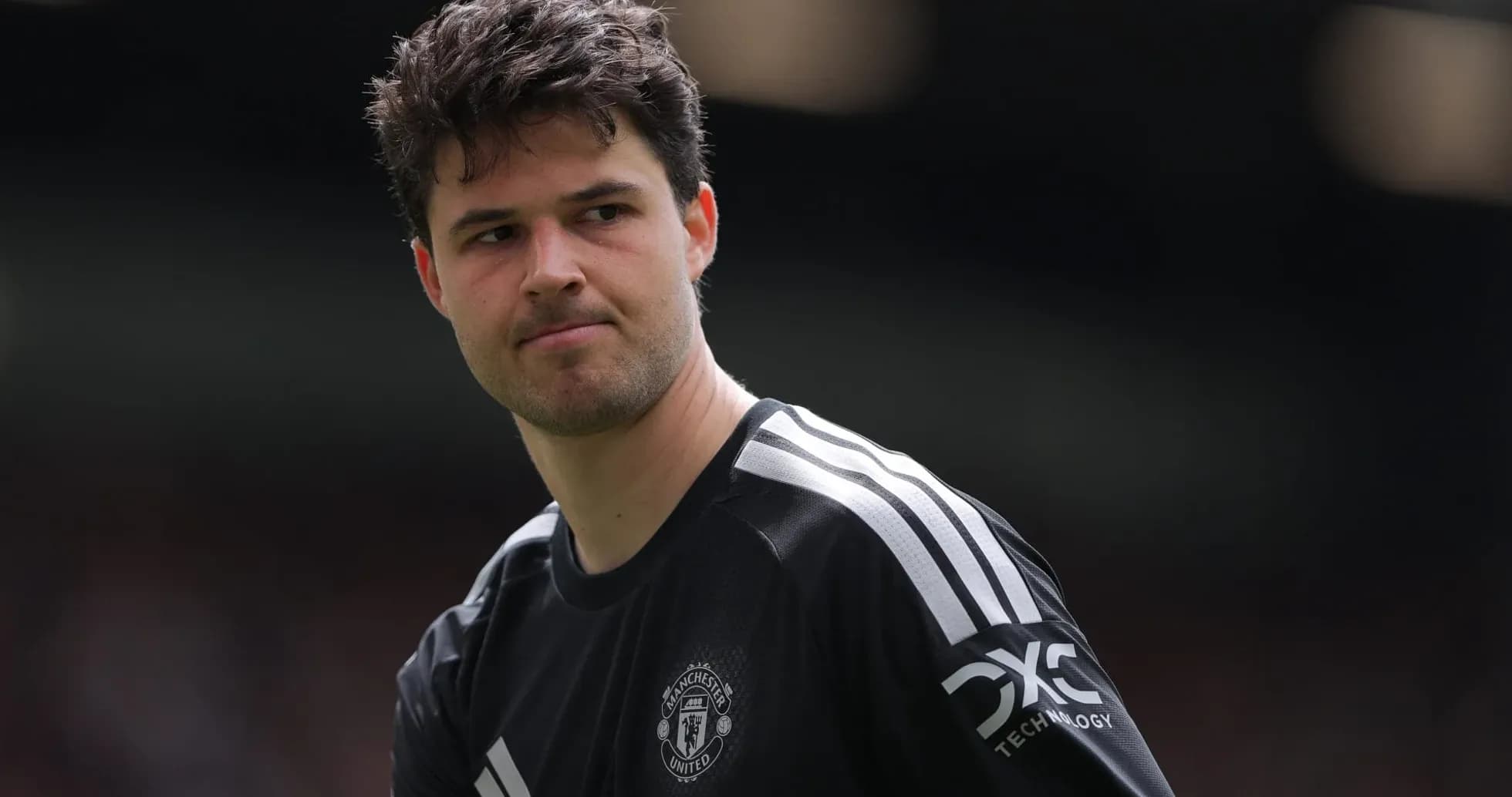 Goalkeeper in Manchester United kit on field Goalkeeper in Manchester United kit on field