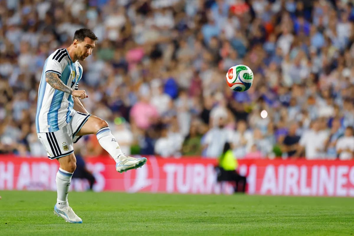 Player kicking a soccer ball during match Player kicking a soccer ball during match
