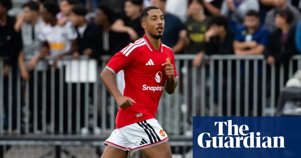 Player in red jersey running on the field Player in red jersey running on the field