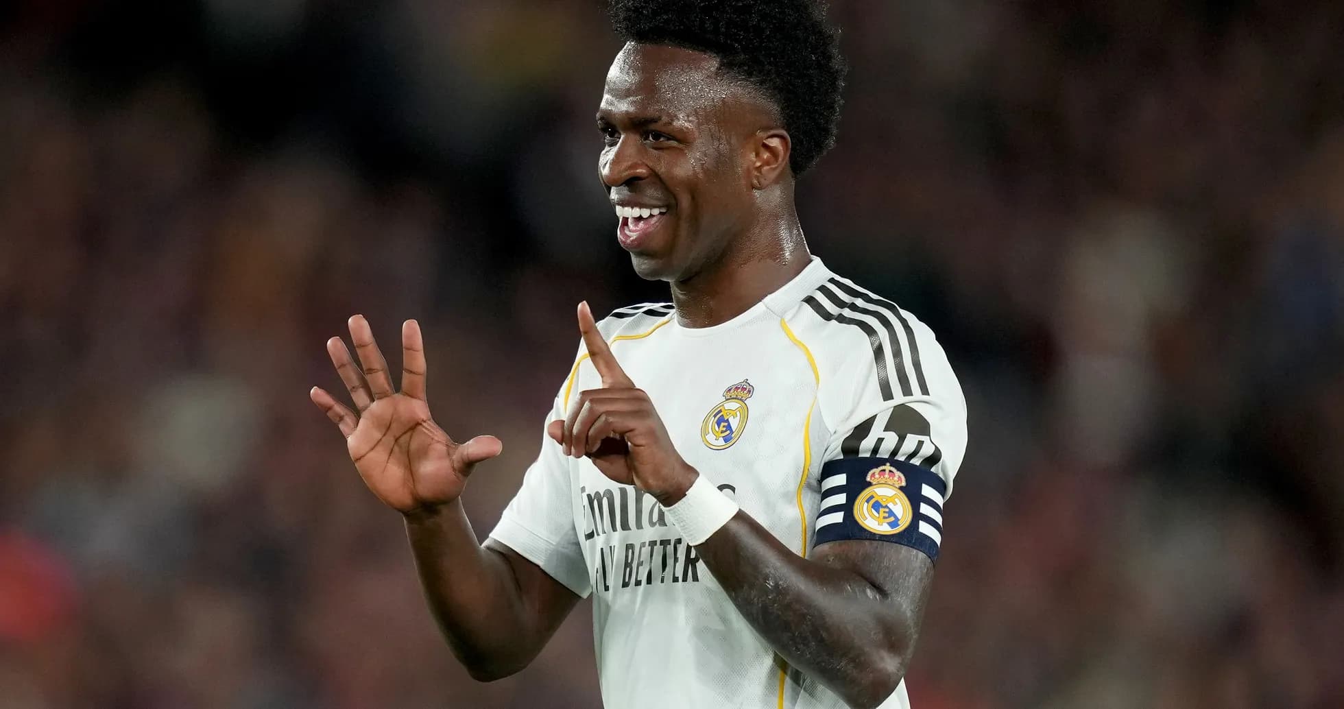 Player celebrating with hand gesture during match Player celebrating with hand gesture during match