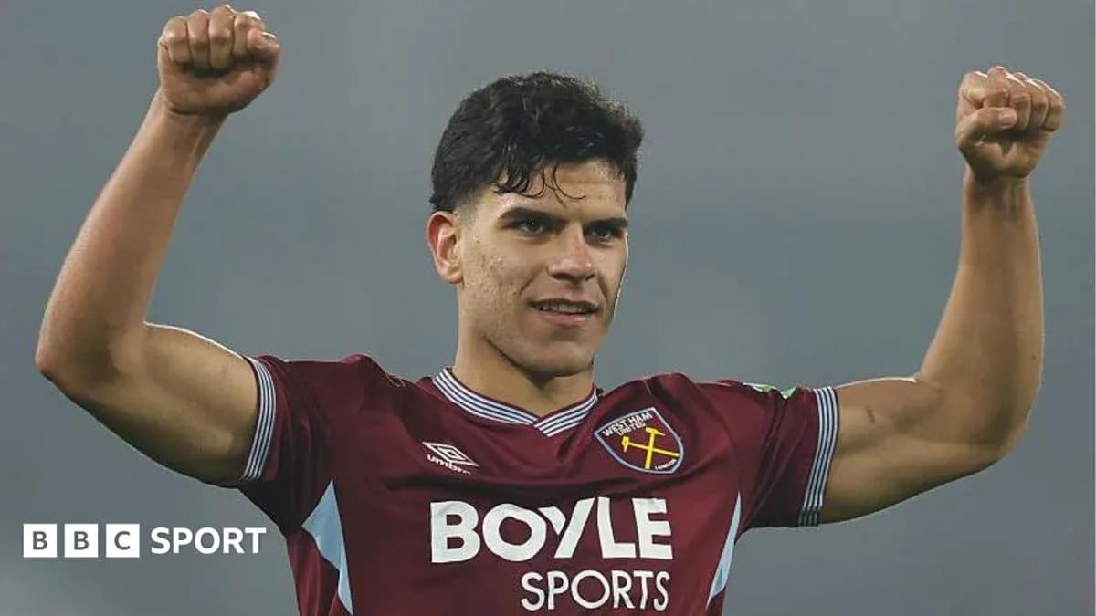 Player celebrating victory with raised arms Player celebrating victory with raised arms