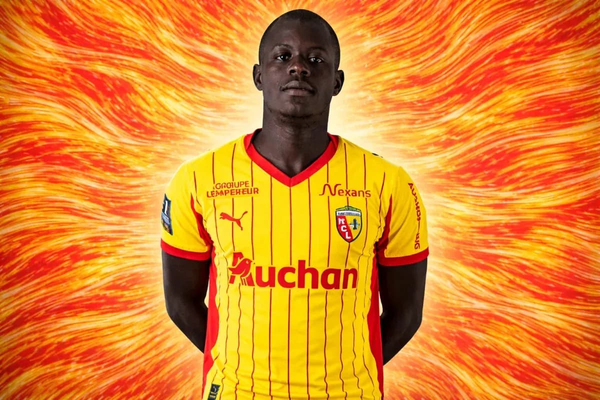 Player posing in yellow and red team jersey Player posing in yellow and red team jersey
