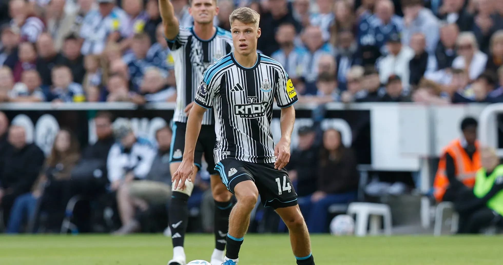 Newcastle player controlling the ball during match Newcastle player controlling the ball during match