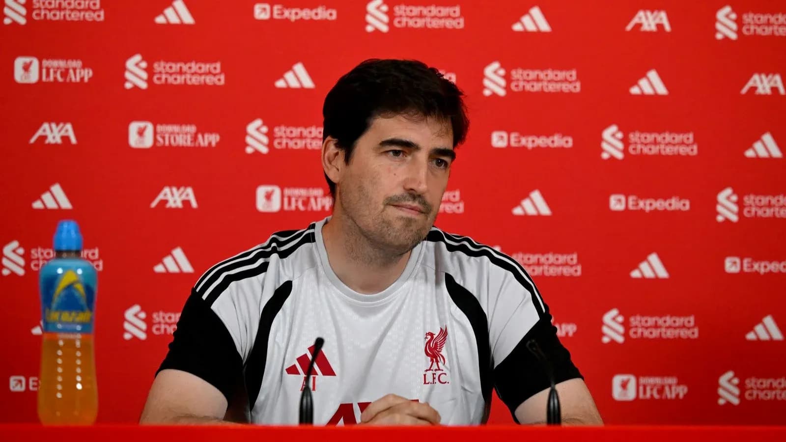 Manager at Liverpool FC press conference table Manager at Liverpool FC press conference table