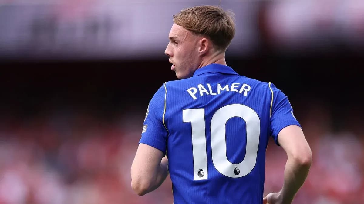 Player in blue jersey with the name Palmer and number 10 Player in blue jersey with the name Palmer and number 10