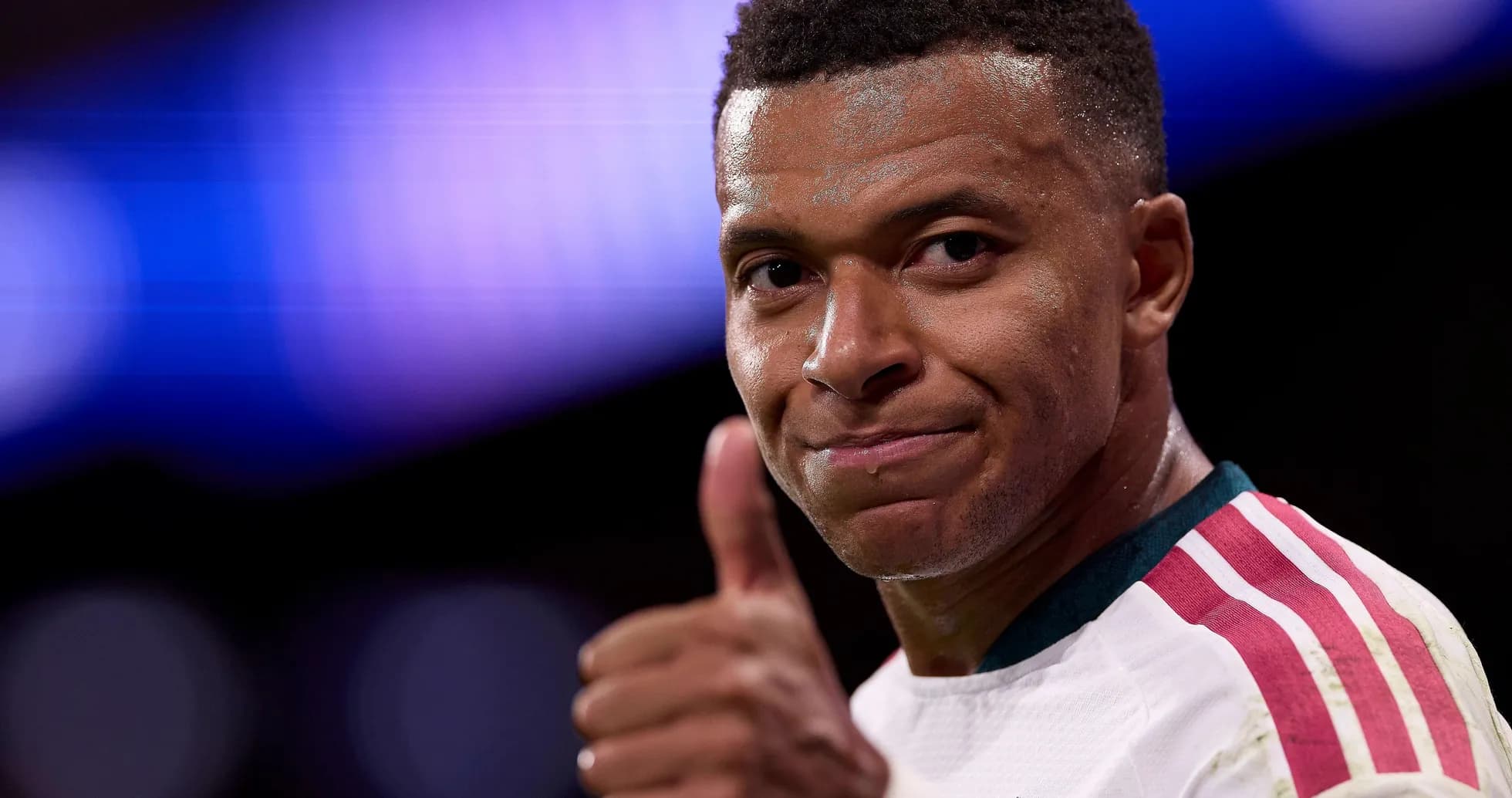Player giving thumbs up after match Player giving thumbs up after match