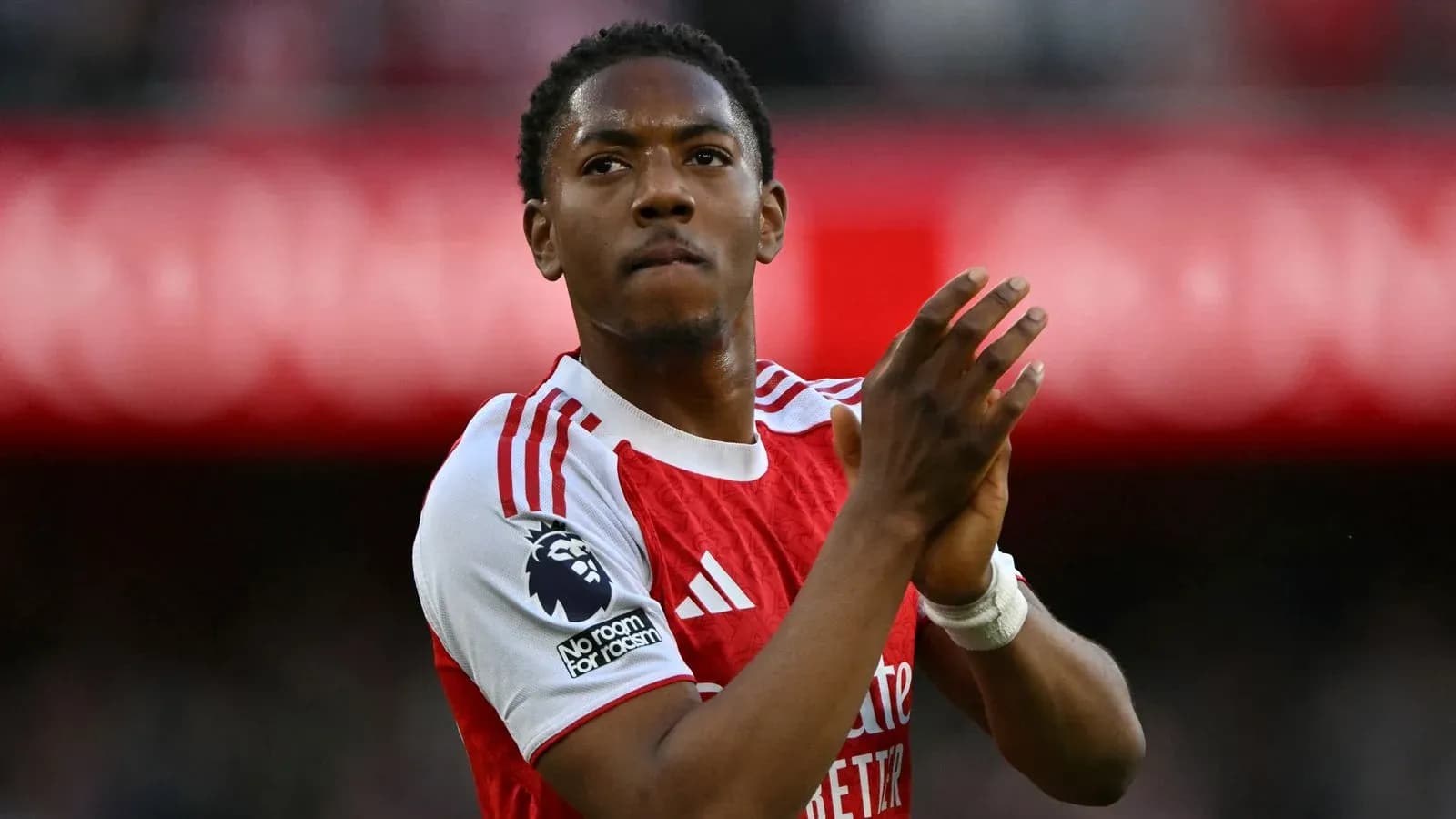 Player applauding fans in Arsenal jersey Player applauding fans in Arsenal jersey