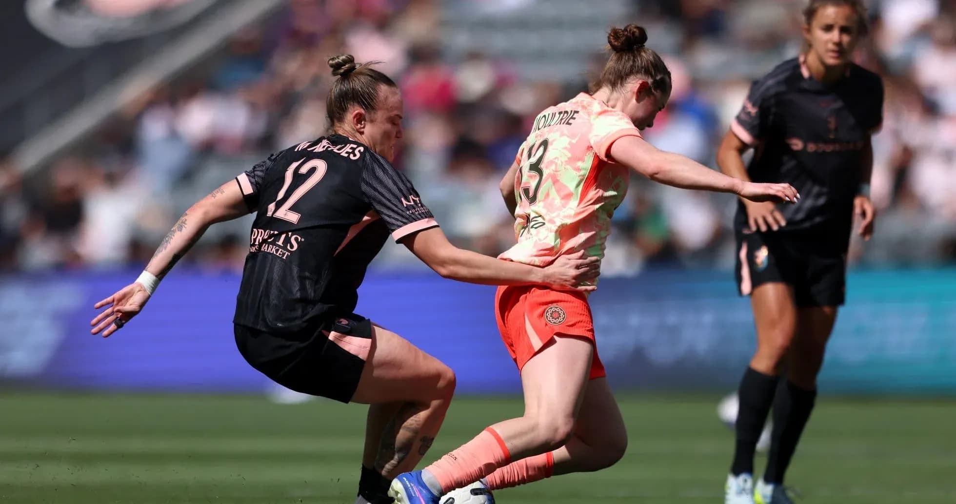 Portland Thorns W player challenged by Utah Royals W opponent Portland Thorns W player challenged by Utah Royals W opponent