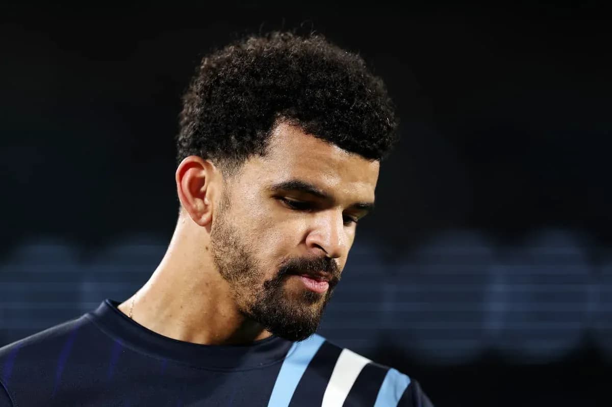 Player looking down during a match Player looking down during a match