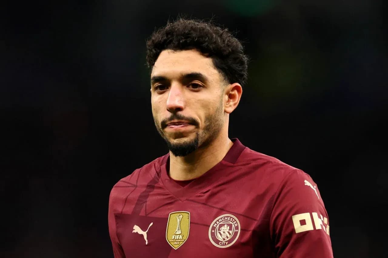 Player in maroon jersey during match Player in maroon jersey during match