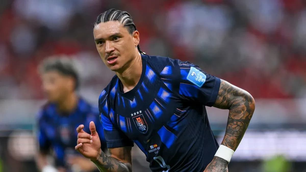 Player in blue jersey running during match Player in blue jersey running during match