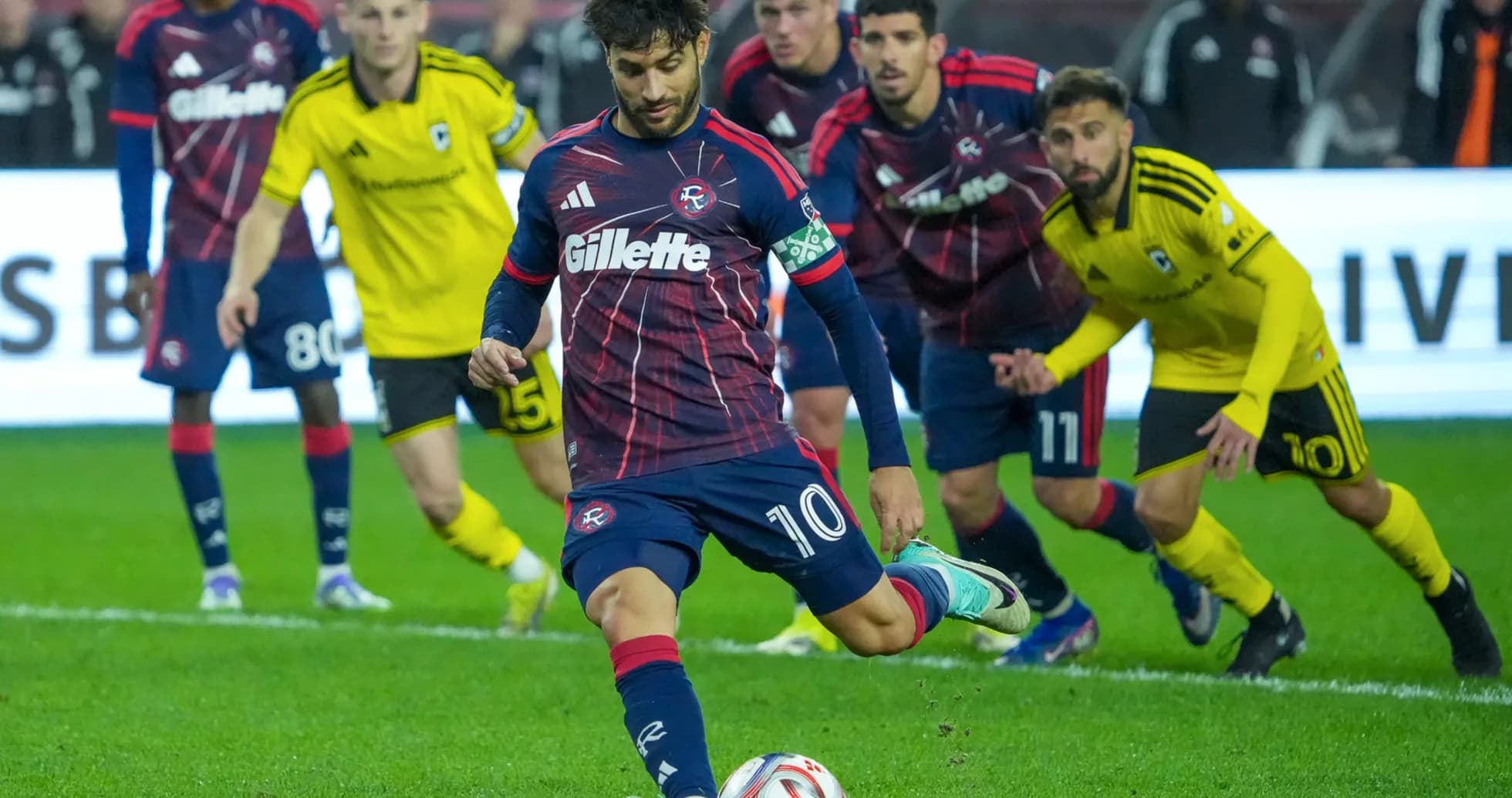 Player taking a penalty kick during match Player taking a penalty kick during match