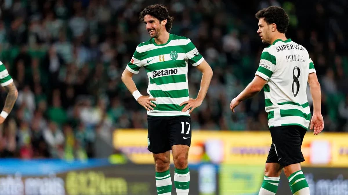 Sporting CP players during a match on field Sporting CP players during a match on field