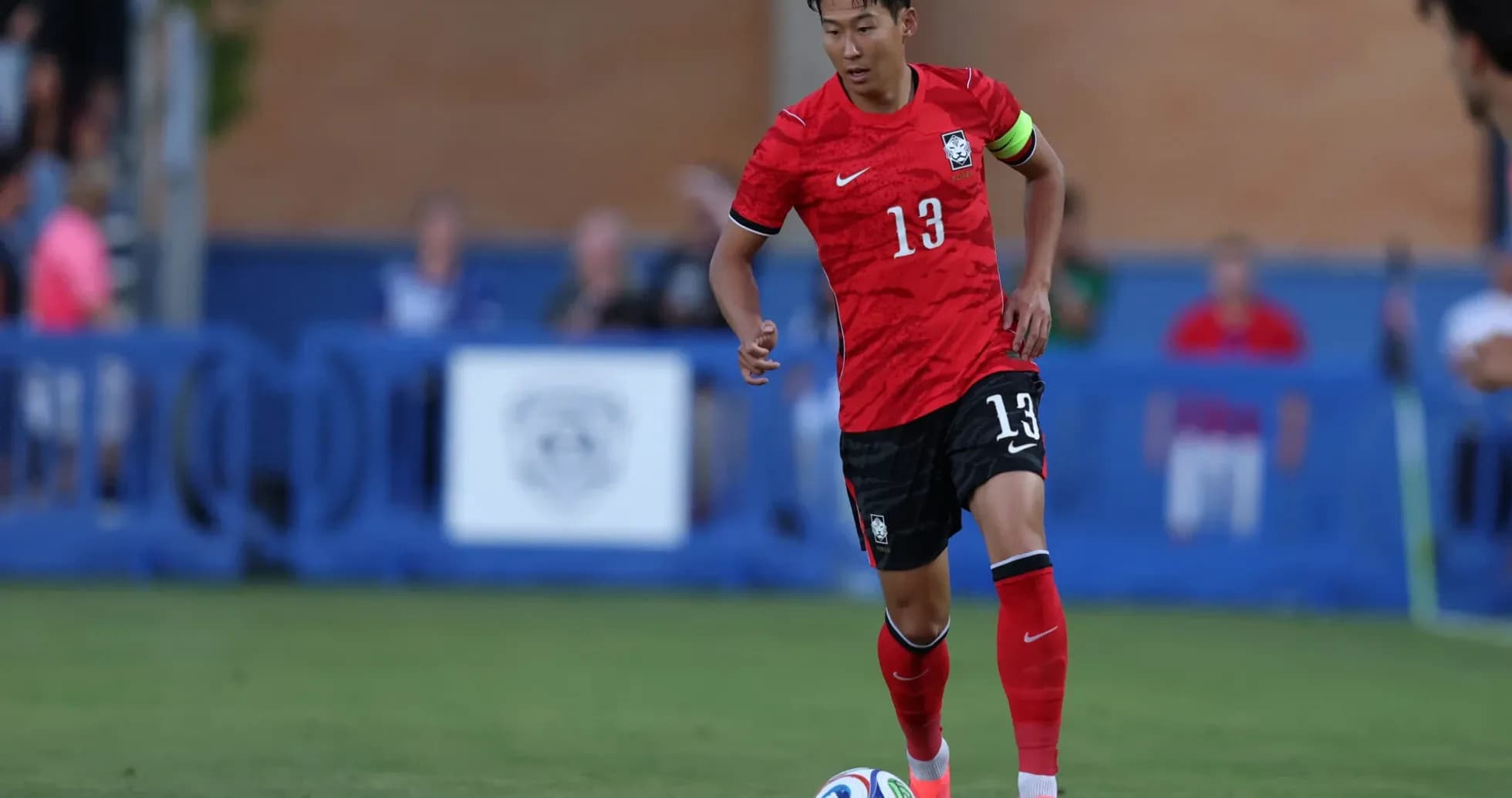 South Korea player dribbling during match South Korea player dribbling during match
