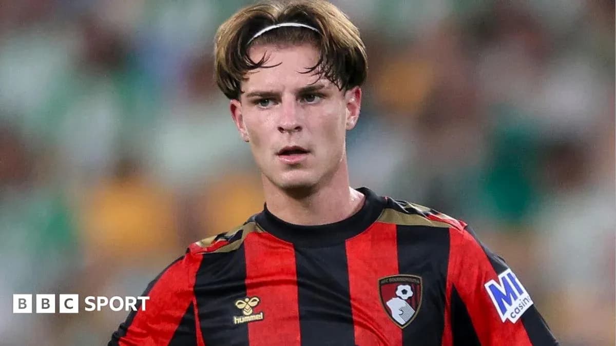 Bournemouth player during match with focused expression Bournemouth player during match with focused expression