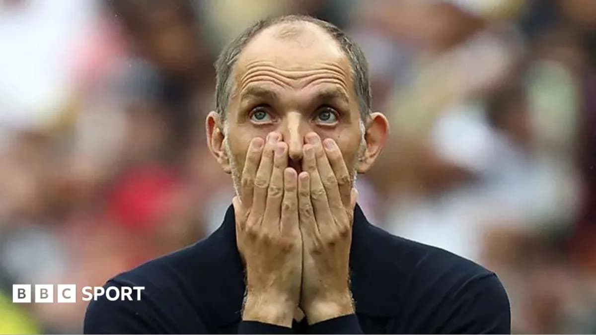 Coach with hands on face during match Coach with hands on face during match