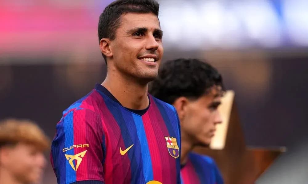 Player in Barcelona jersey celebrating with teammates Player in Barcelona jersey celebrating with teammates