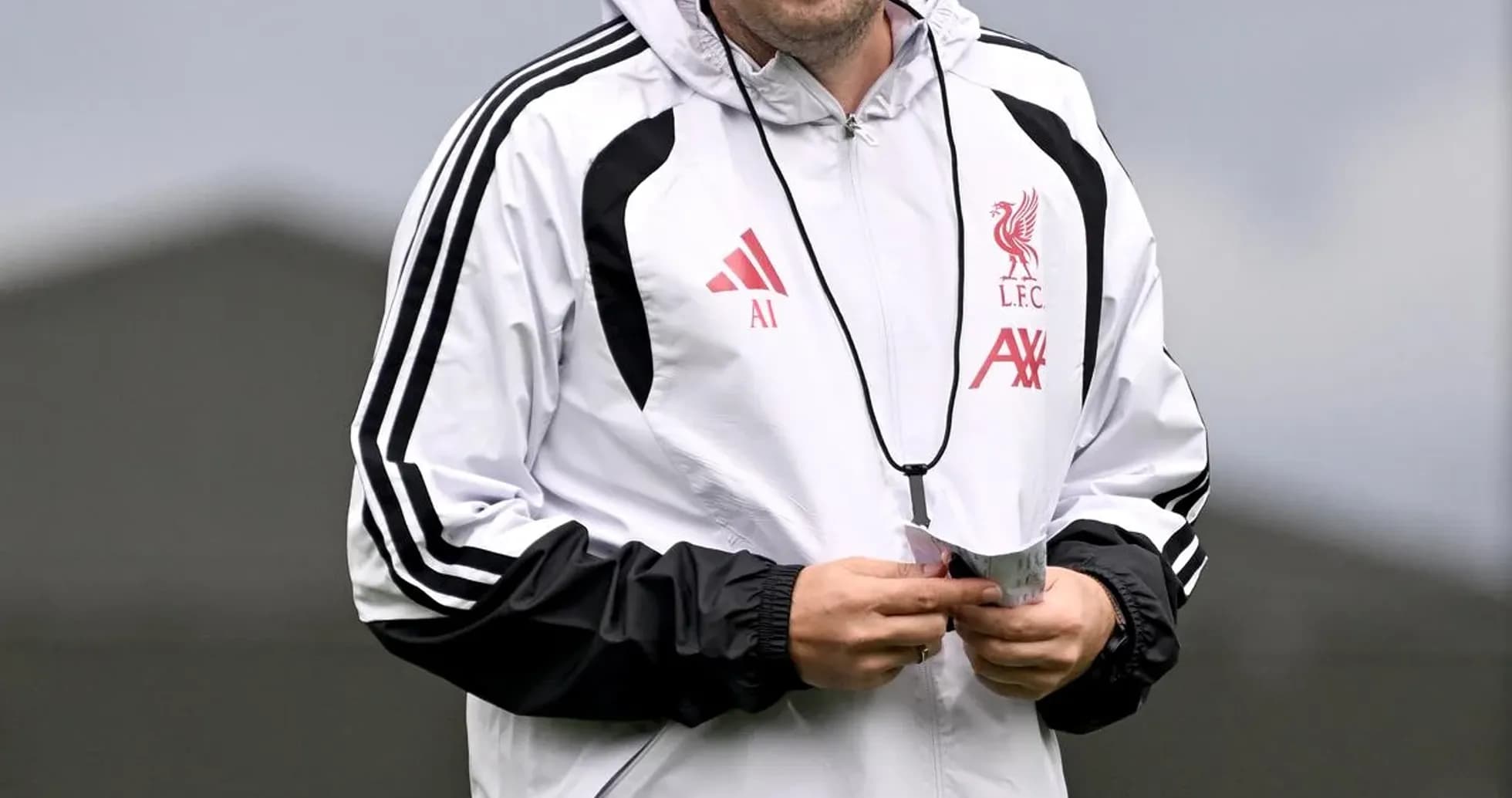 Coach walking during training session at Liverpool Coach walking during training session at Liverpool