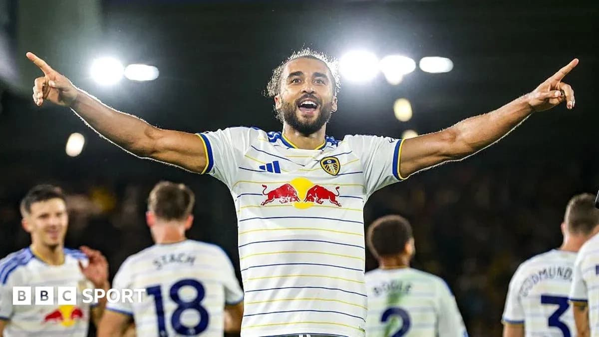Player celebrating with teammates after scoring goal Player celebrating with teammates after scoring goal