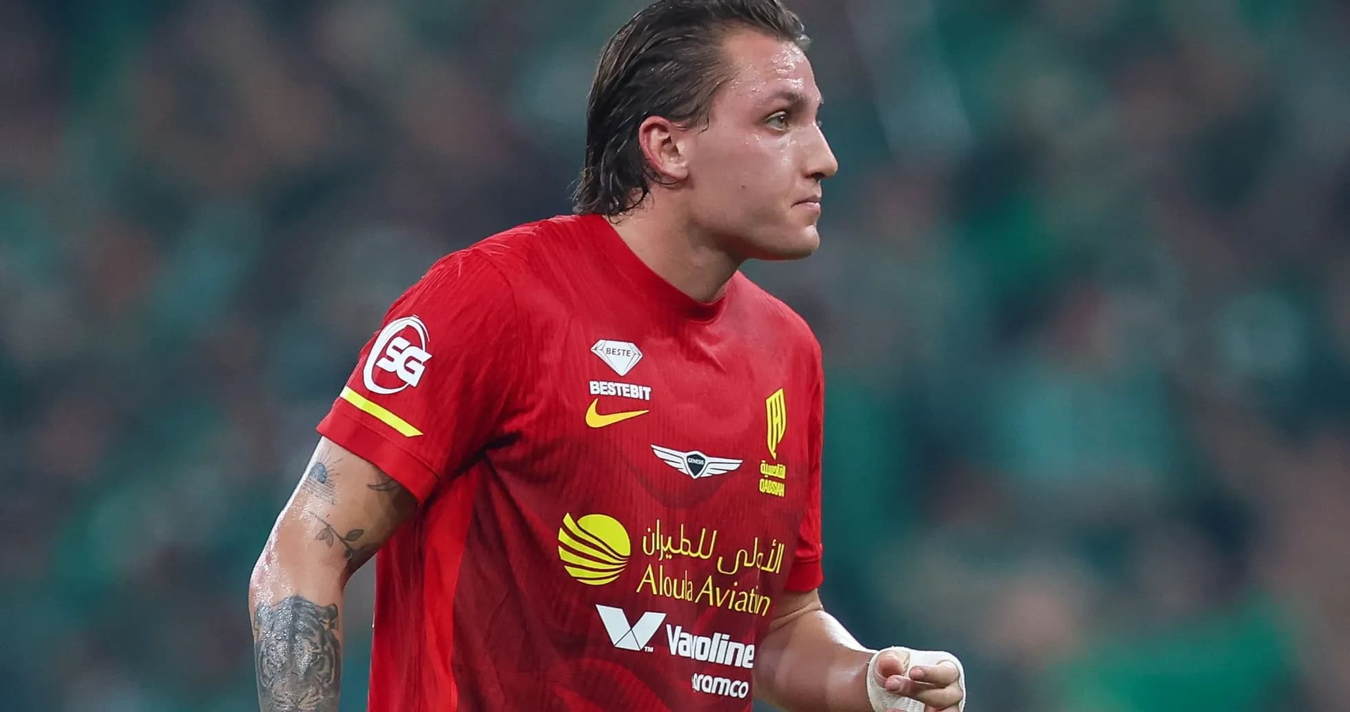 Player wearing red jersey during match Player wearing red jersey during match