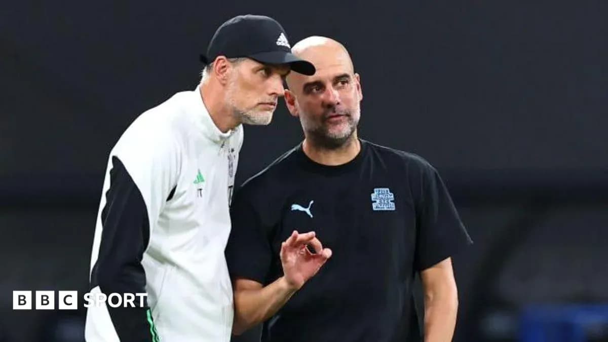 Two football managers discussing on the sidelines Two football managers discussing on the sidelines
