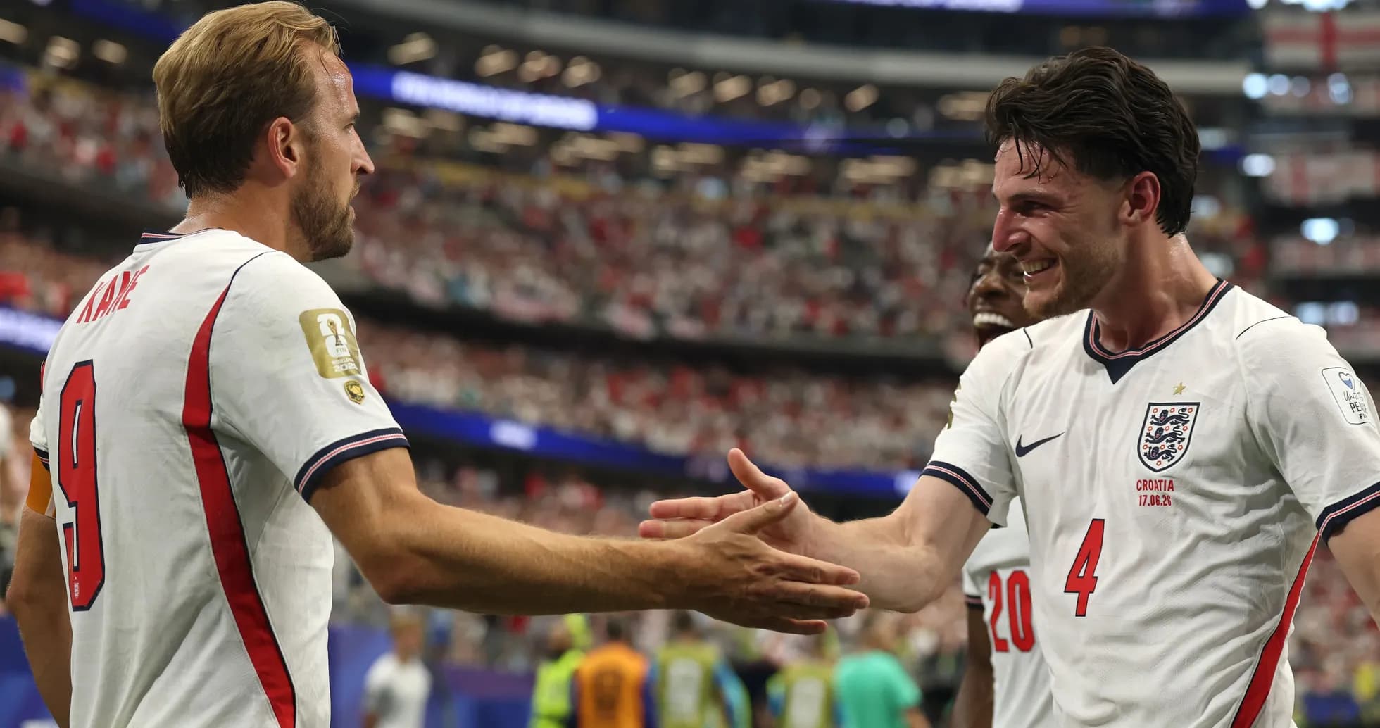 Harry Kane and Declan Rice celebrating on field Harry Kane and Declan Rice celebrating on field
