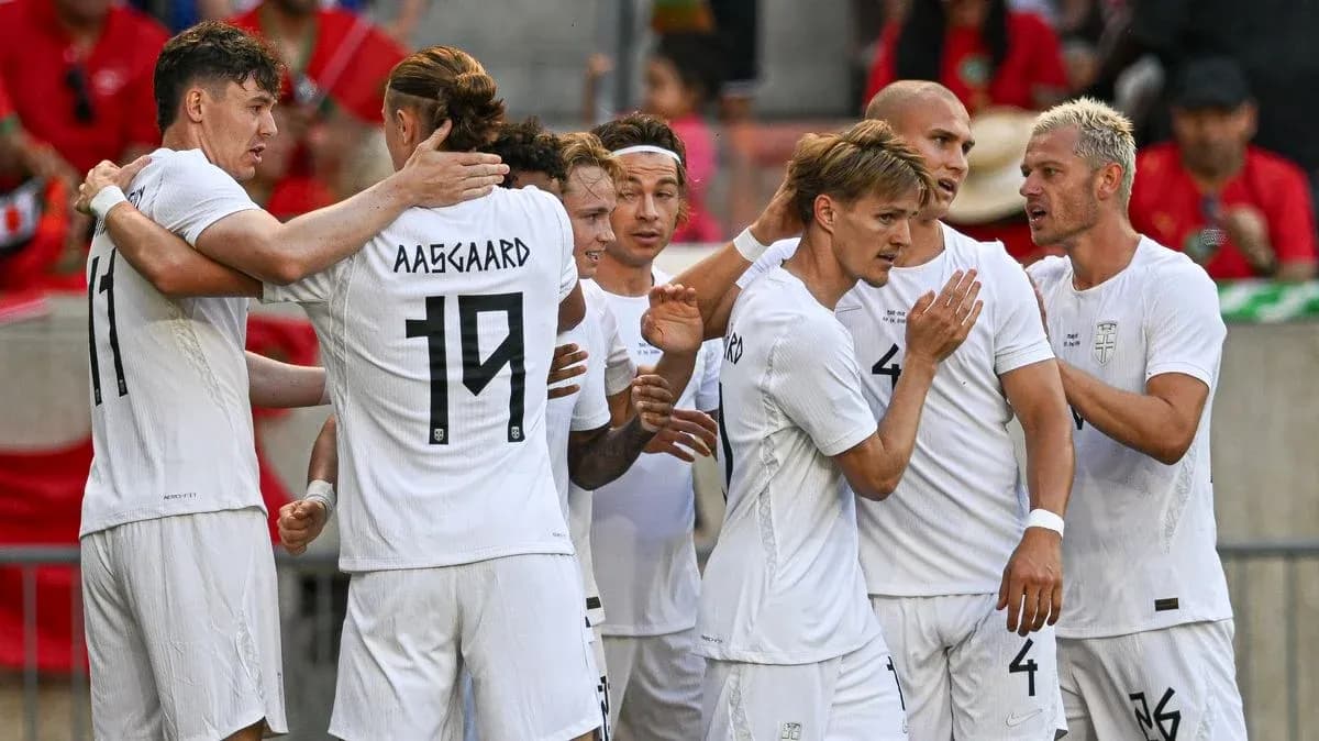 Players celebrating after scoring a goal during match Players celebrating after scoring a goal during match