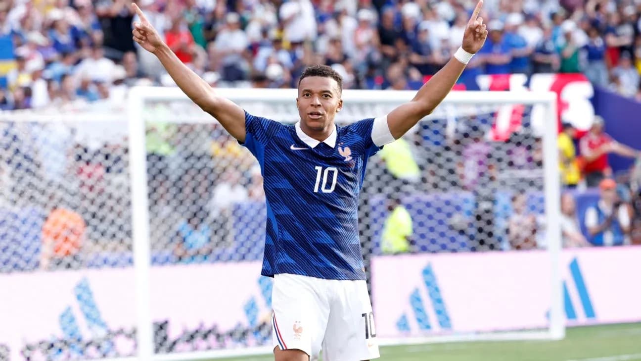 Kylian Mbappé celebrating a goal for France Kylian Mbappé celebrating a goal for France