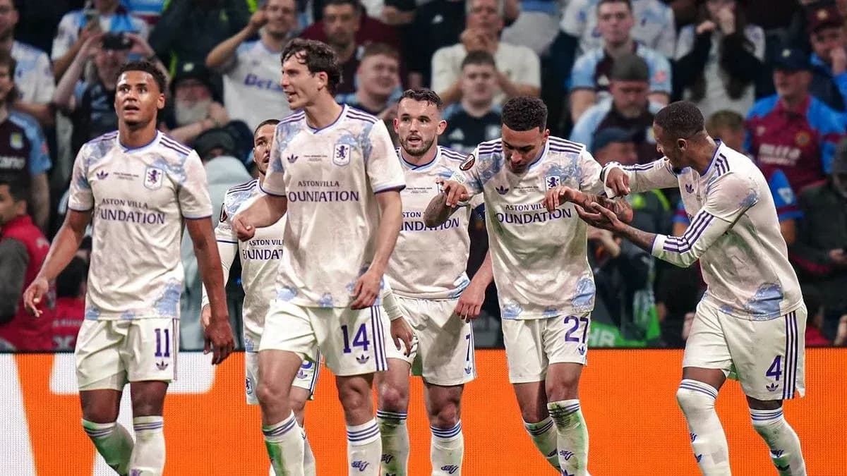 Aston Villa players celebrating a goal together Aston Villa players celebrating a goal together