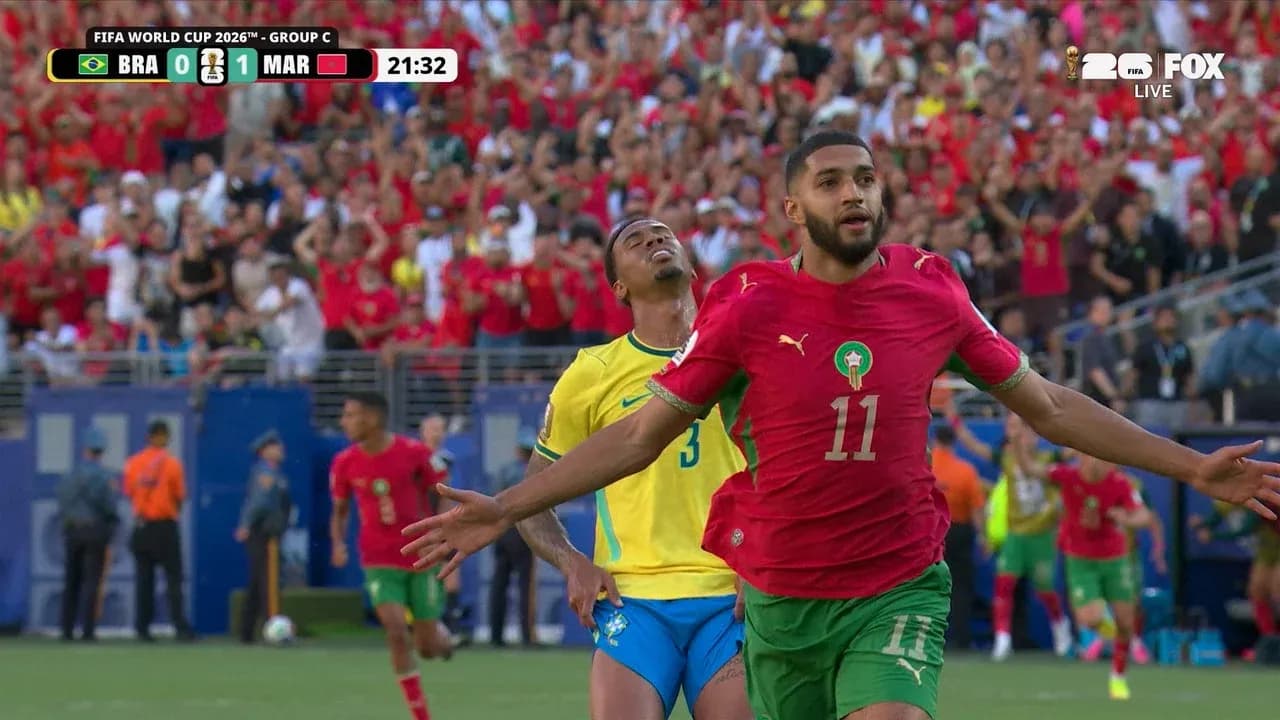 Morocco player celebrates scoring against Brazil Morocco player celebrates scoring against Brazil