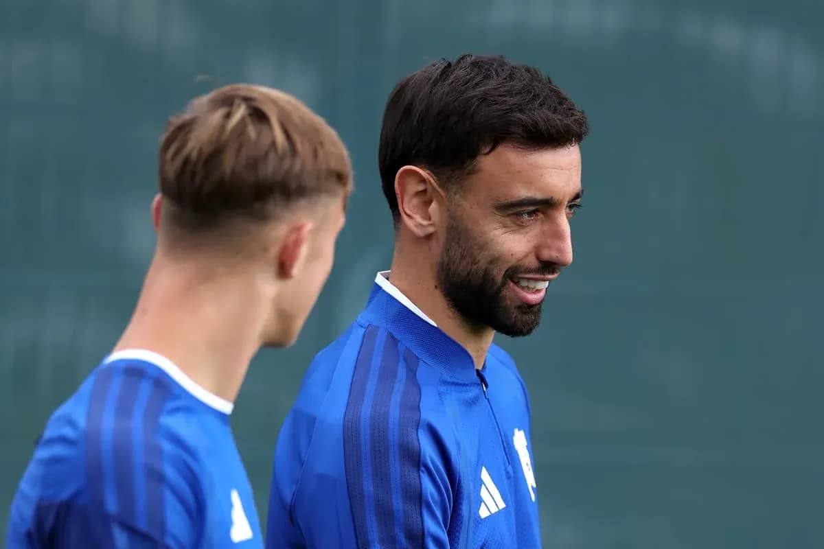 Two players talking during training session Two players talking during training session