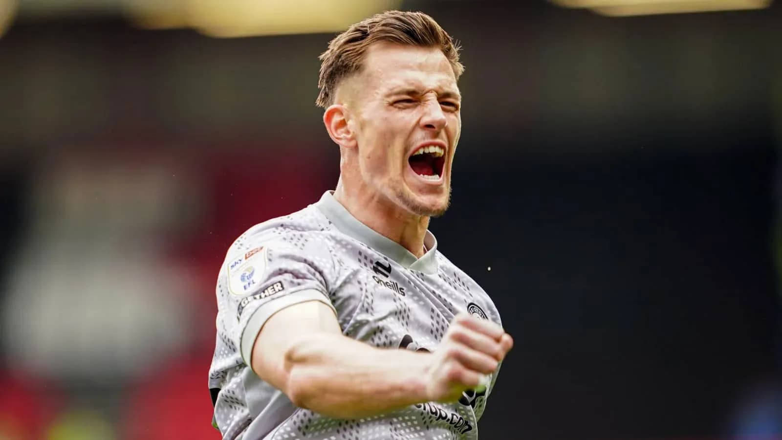 Goalkeeper celebrating after a match victory Goalkeeper celebrating after a match victory