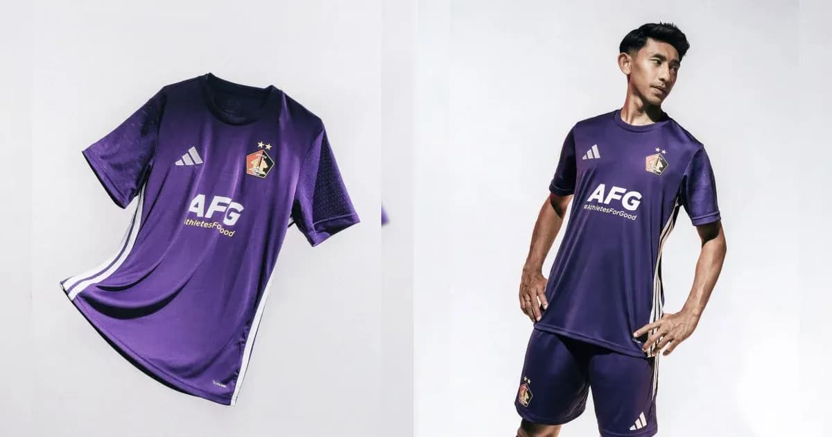 Purple football kit displayed with model wearing it Purple football kit displayed with model wearing it