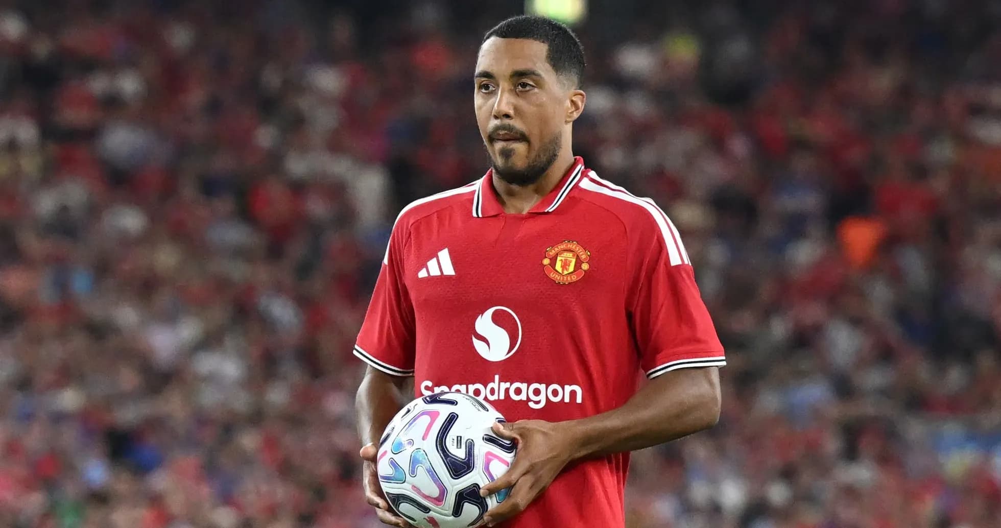 Player holding ball during Manchester United match Player holding ball during Manchester United match