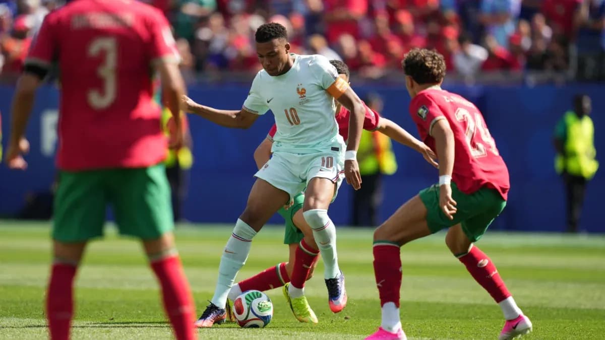 Player dribbling the ball during match between France and Morocco Player dribbling the ball during match between France and Morocco