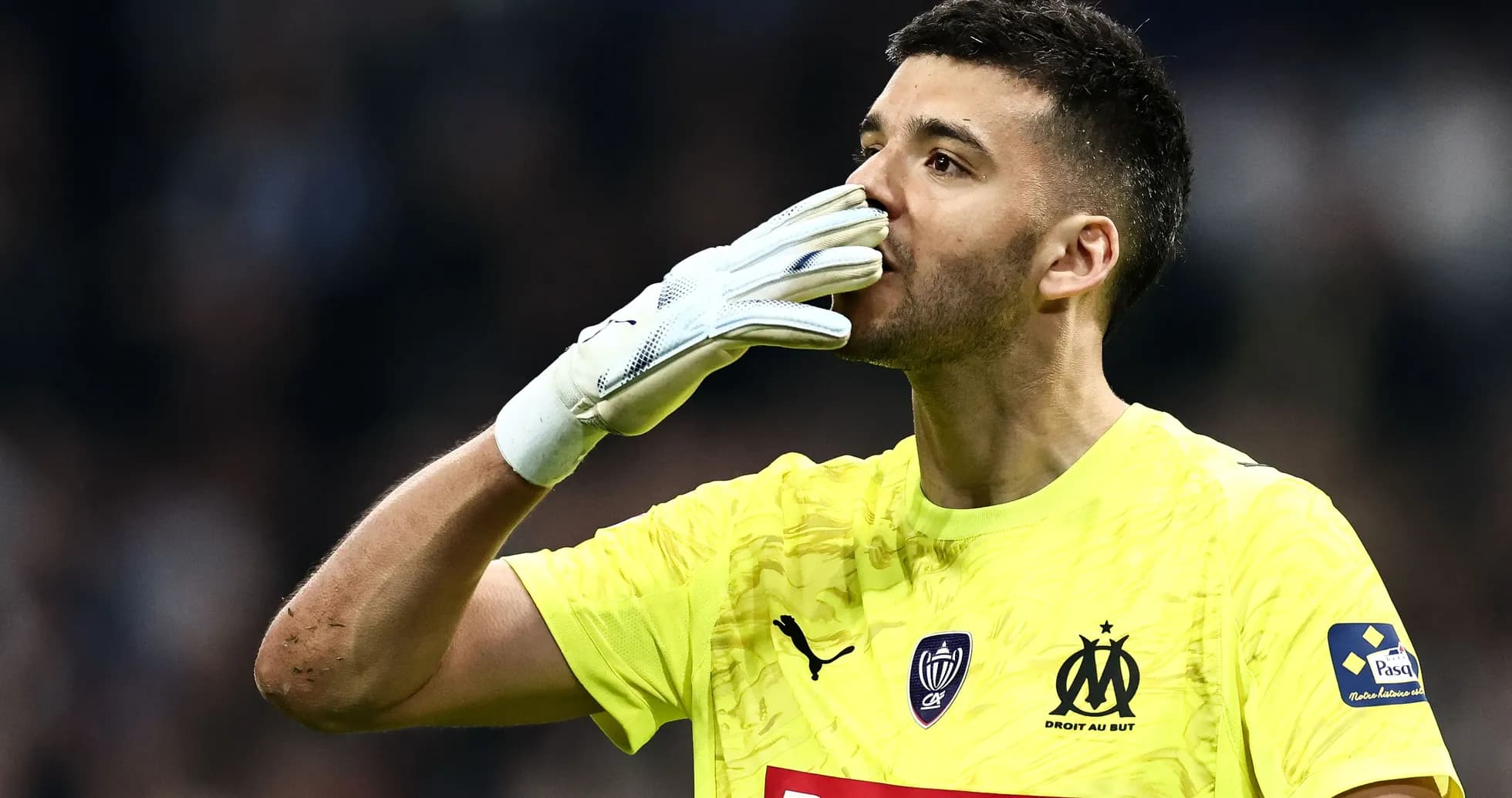Goalkeeper celebrating with a kiss gesture Goalkeeper celebrating with a kiss gesture